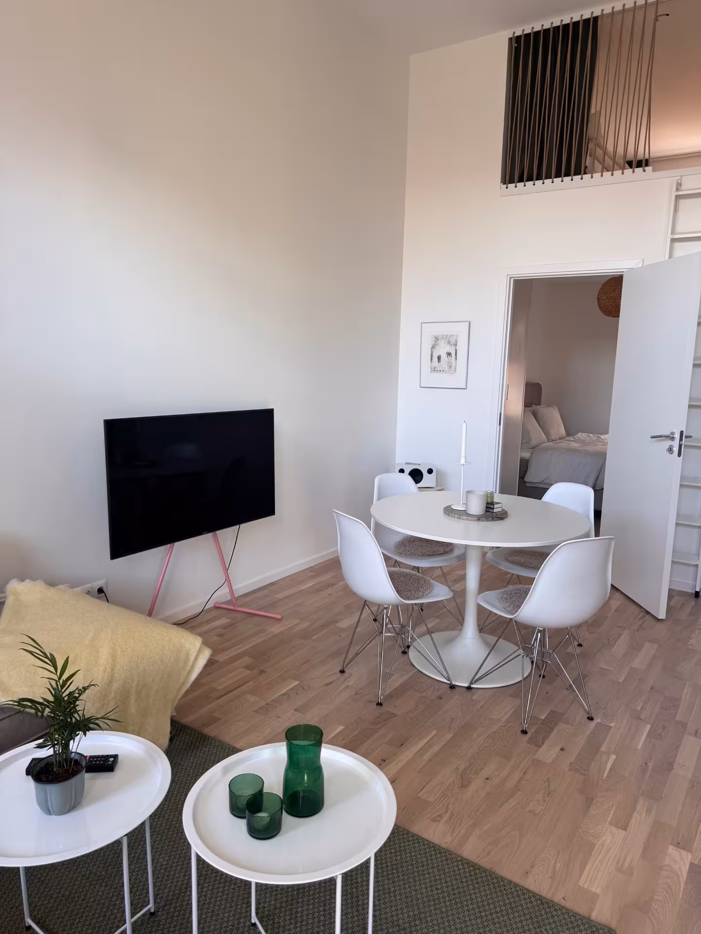 Dining area with view towards the bedroom and sleeping loft